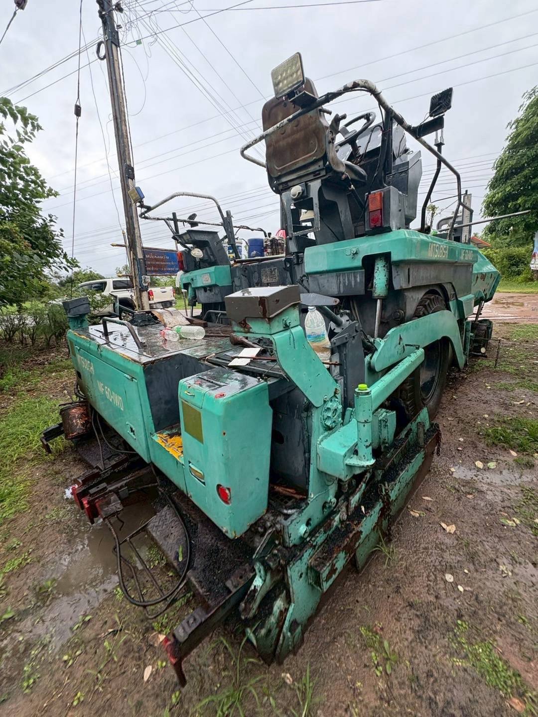 รถปูยาง 6 เมตร Mitsubishi MF60 WD