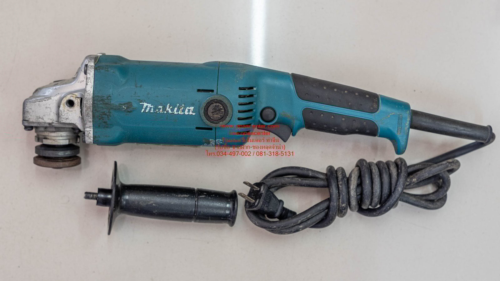 MAKITA เครื่องเจียรไฟฟ้า ขนาด 5 นิ้ว รุ่น GA-5010 12,000 รอบนาที ของแท้ มือสอง สภาพดี MAKITA เครื่องเจียรไฟฟ้า ขนาด 5 นิ้ว รุ่น GA-5010 12,000 รอบนาที ของแท้ มือสอง สภาพดี