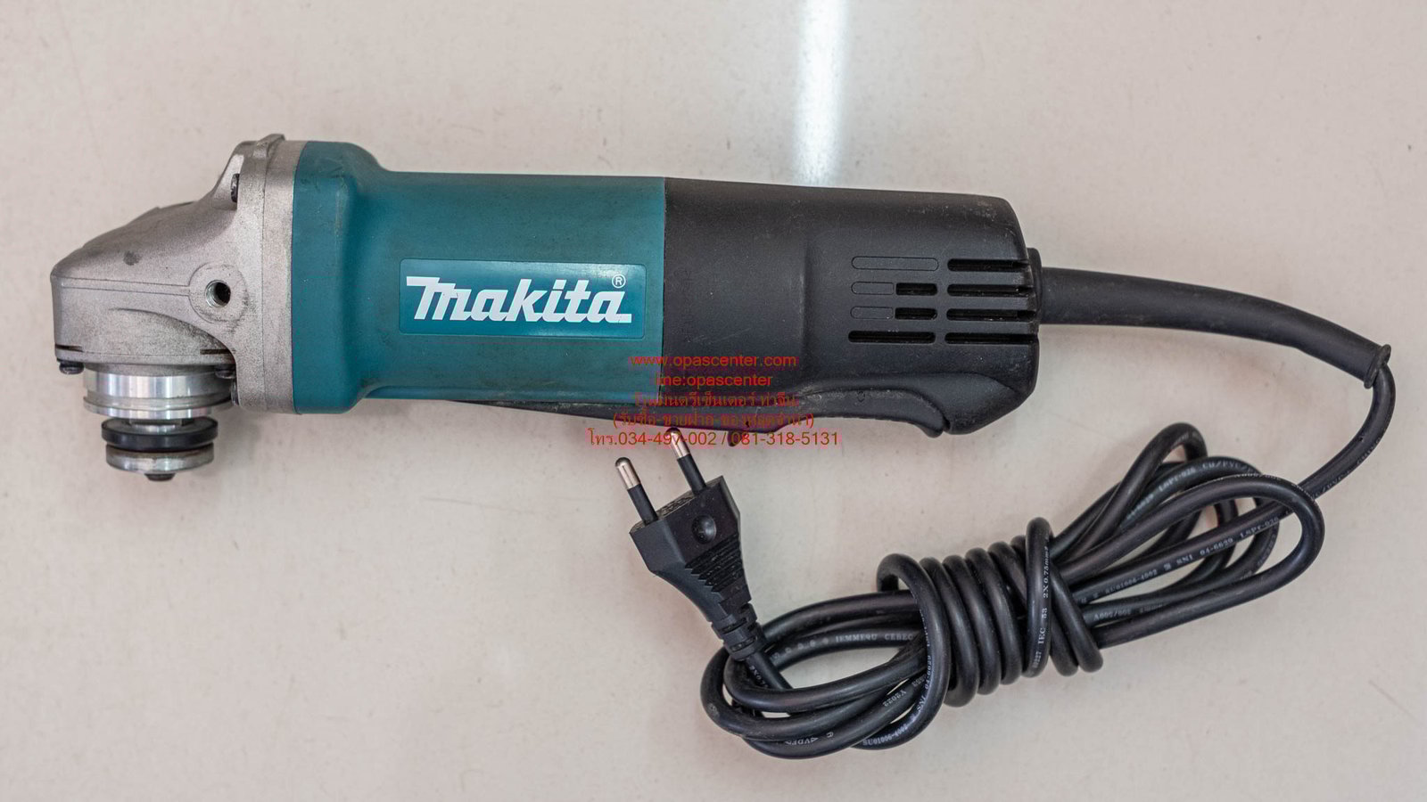 เครื่องเจียรไฟฟ้ามากีต้าร์ MAKITA 4 นิ้ว 840 วัตต์ รุ่น 9556HP ความเร็วรอบ 11,000 รอบนาที สวิตช์บีบ 