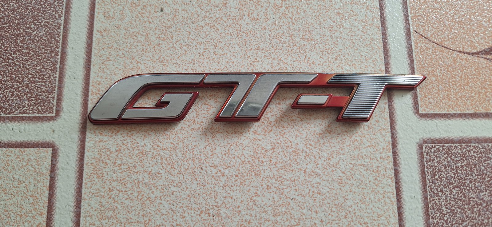 เพลทโลโก้ GT-T แท้ มือสองญี่ปุ่น ขนาด 2.4 × 16 เซนติเมตร