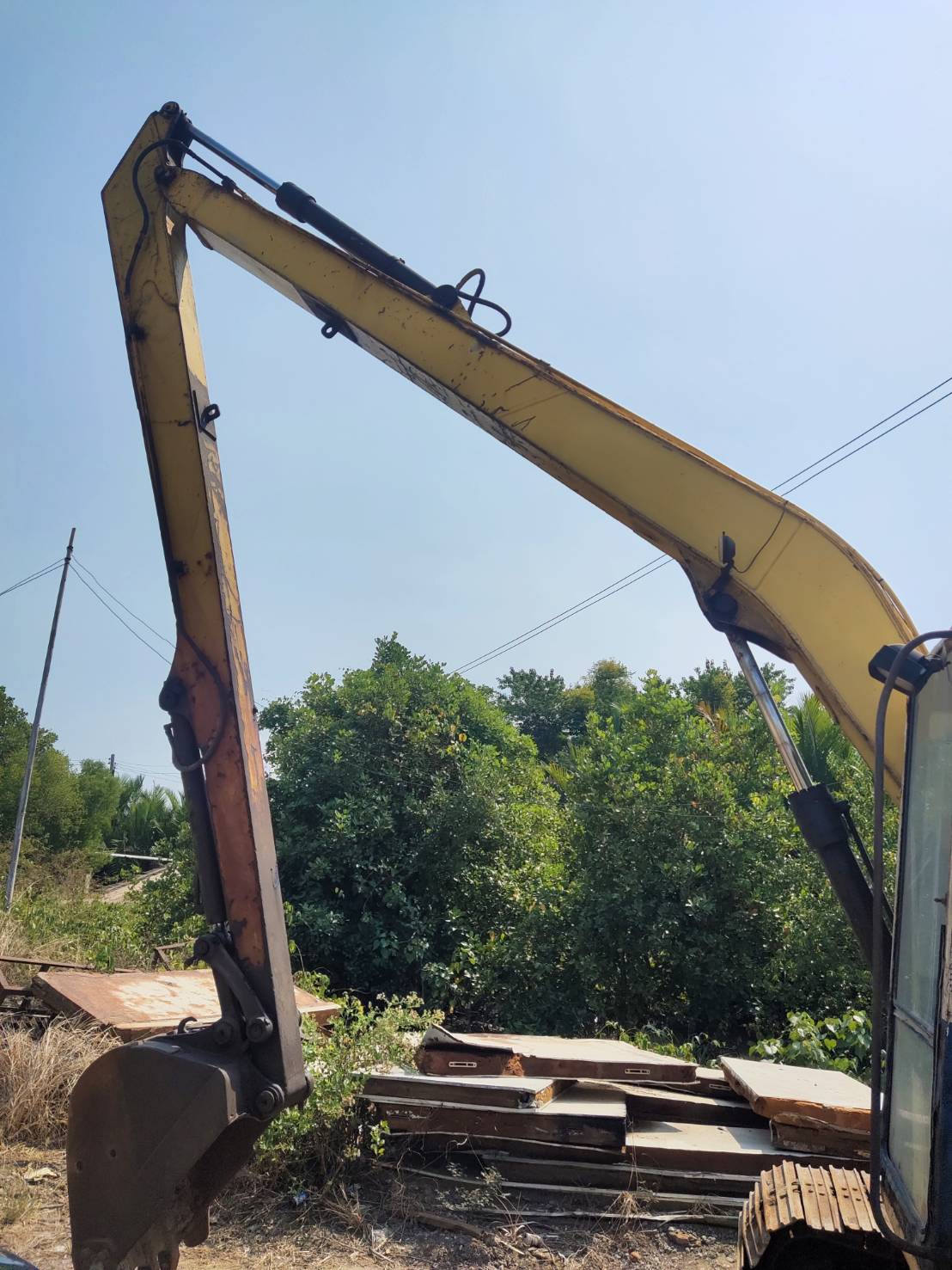 Komatsu60-5บูมยาวพร้อมโป๊ะคอนโทนน้ำมัน