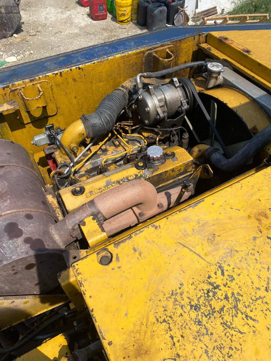 Komatsu60-5บูมยาวพร้อมโป๊ะคอนโทนน้ำมัน