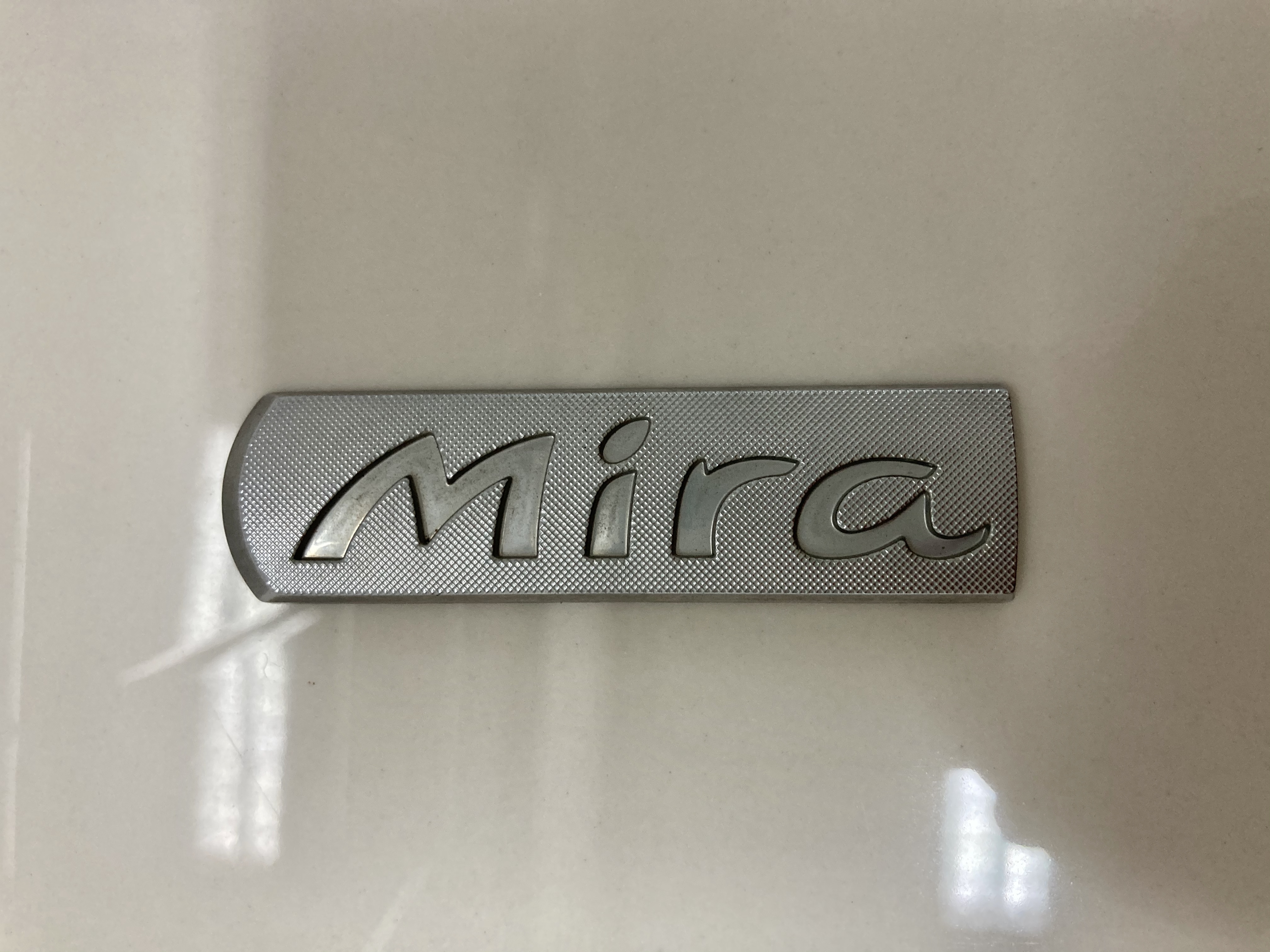 ขายโลโก้คำว่ามิร่าด้านหลังรถ DAIHATSU รุ่น MIRA L80