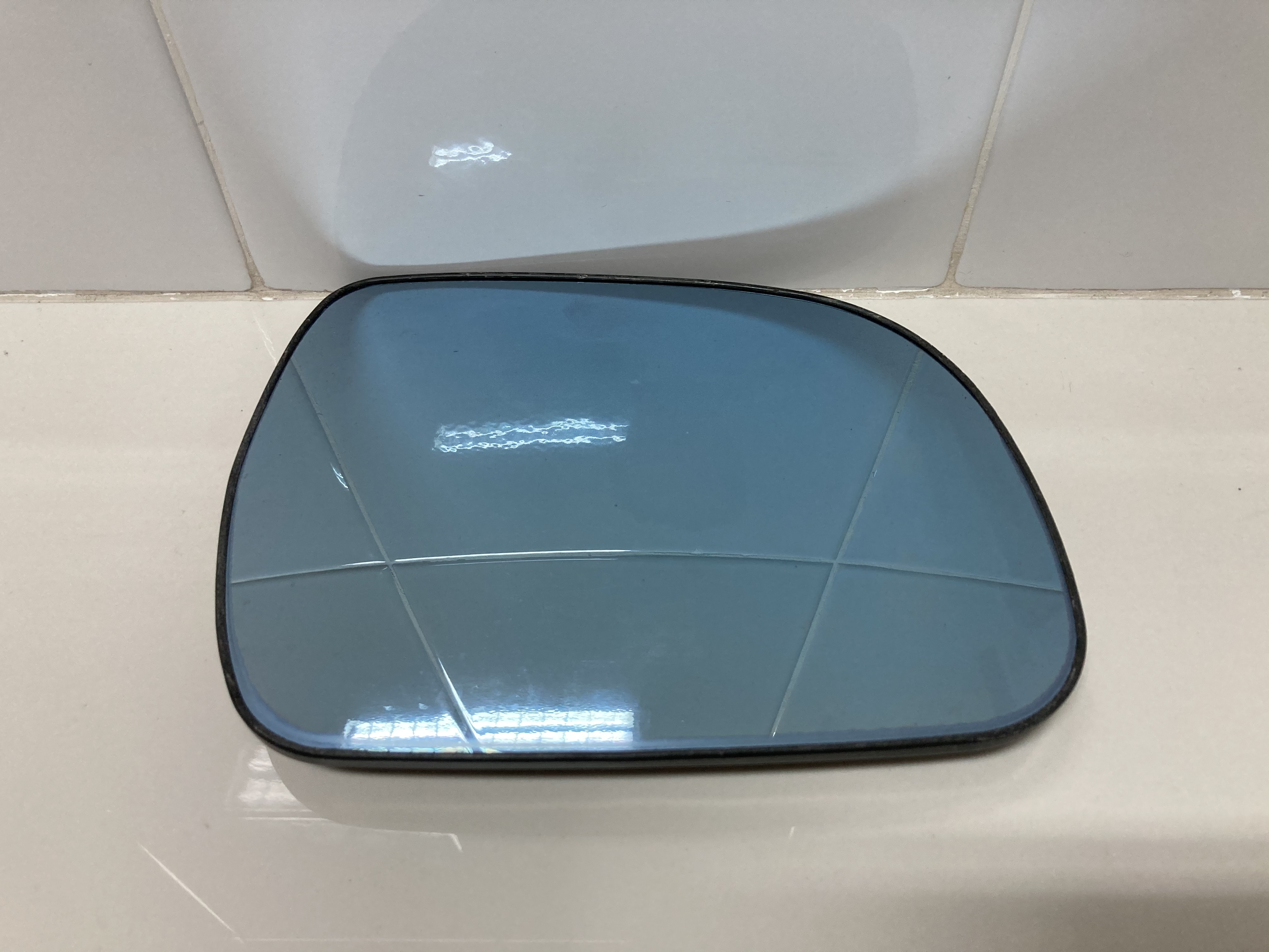 ขายเลนส์กระจกมองข้างตัดแสง TOYOTA รุ่น ALPHARD ปี08