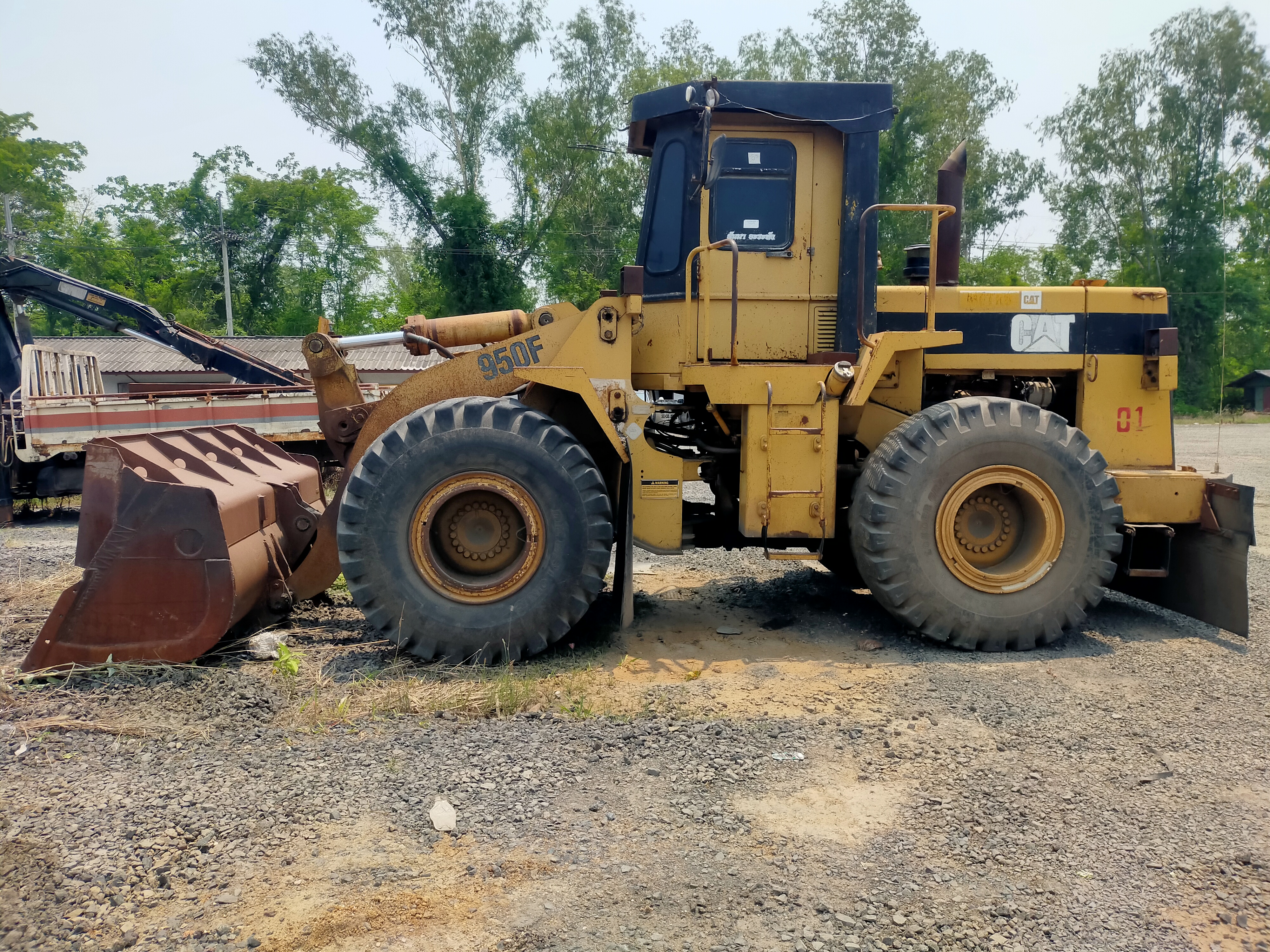 ขายรถตักล้อยาง cat 950 f เอกสารเล่มทะเบียน