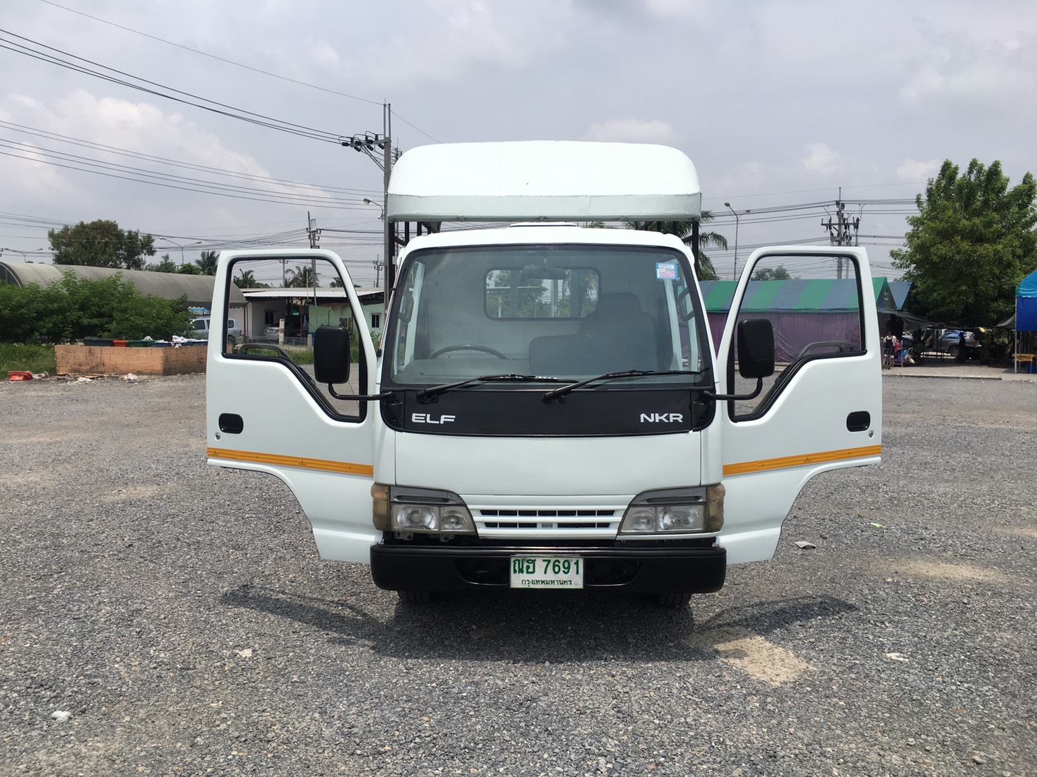 ขายรถ ISUZU NKR 100 แรงเทอร์โบปี 2548 (รถห้าง)ป้ายแบบไม่ติดเวลา 