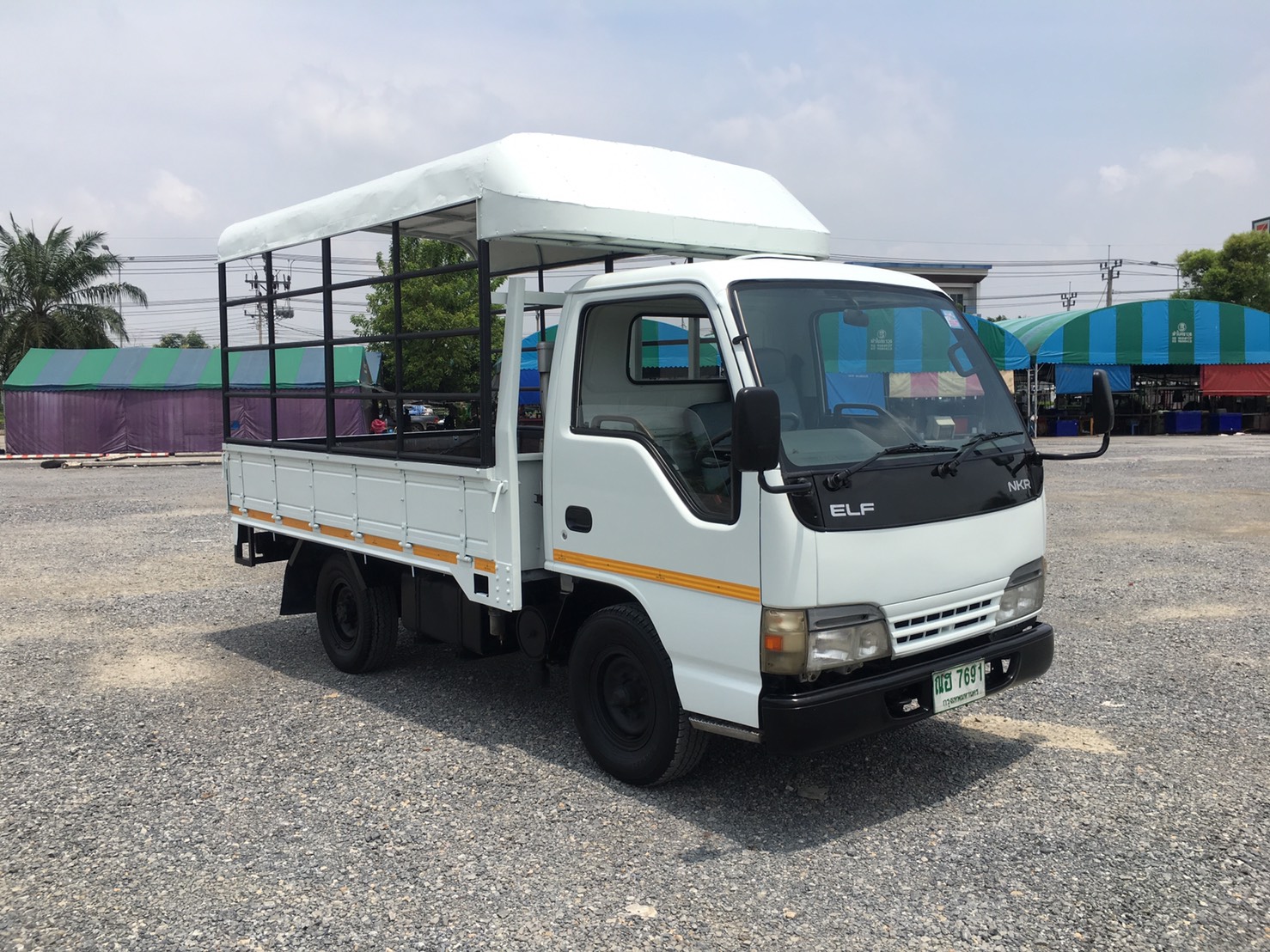 ขายรถ ISUZU NKR 100 แรงเทอร์โบปี 2548 (รถห้าง)ป้ายแบบไม่ติดเวลา 