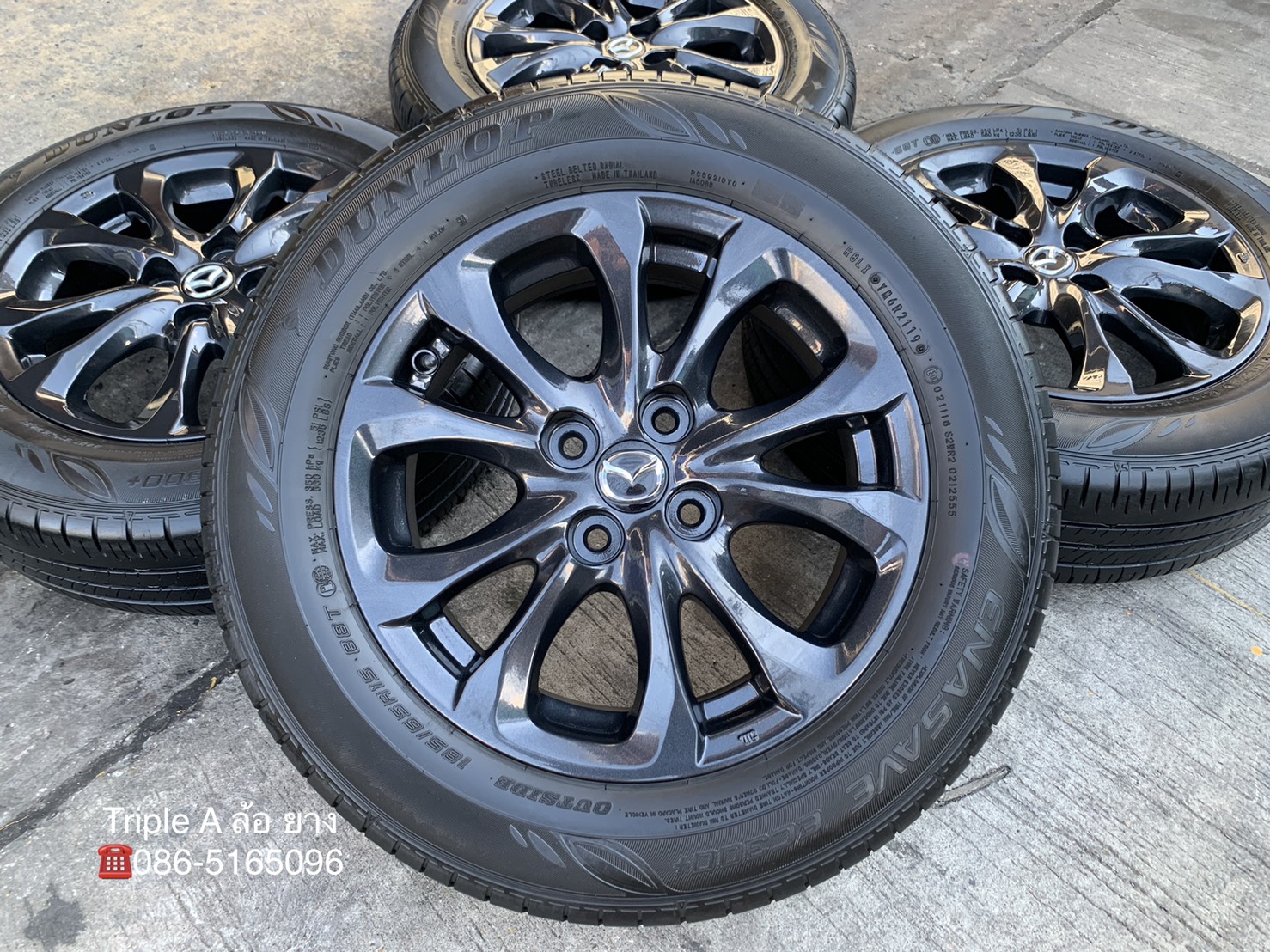 ล้อแม็ก Mazda 2 Skyactiv ขอบ 15 สีมิดไนท์บลู พร้อมยาง 185-65-15 Dunlop ปี 19 ล้อแม็ก Mazda 2 Skyactiv ขอบ 15 สีมิดไนท์บลู พร้อมยาง 185-65-15 Dunlop ปี 19