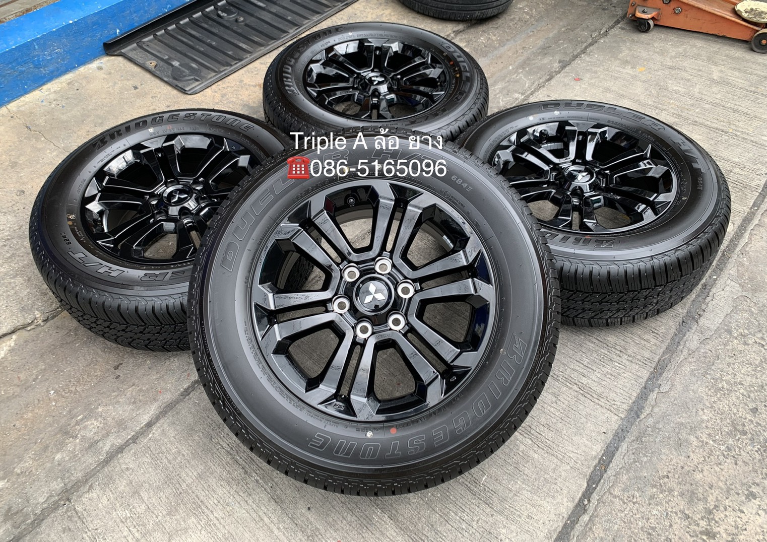 ล้อแม็กป้ายแดง Mitsu Triton Athlete รุ่นใหม่ล่าสุด ขอบ 18 สีดำแท้ พร้อมยางป้ายแดง 265-60-18 Bridgestone ปี 21 สวยกริ๊บๆ