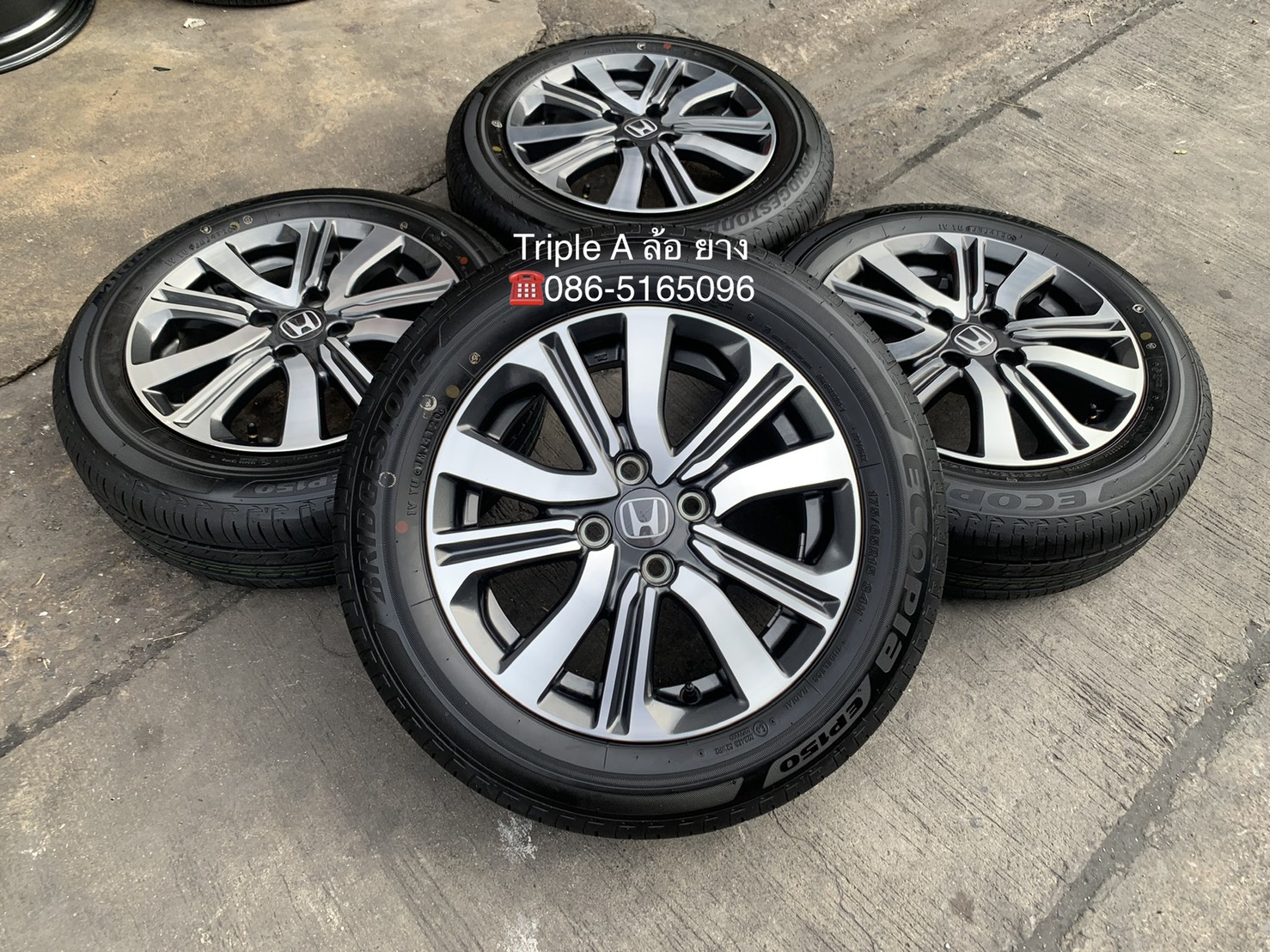 ล้อแม็ก Honda City ตัวท็อป ขอบ 15 ดำหน้าเงา พร้อมยางใหม่ป้ายแดง 175-65-15 Bridgestone ปลายปี 20