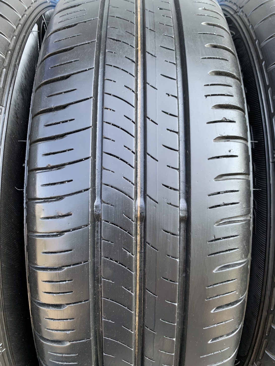 ล้อแม็ก Nissan March ขอบ 15 สีเทากัน พร้อมยาง 185-65-15 Dunlop ปลายปี 19 สวยๆ