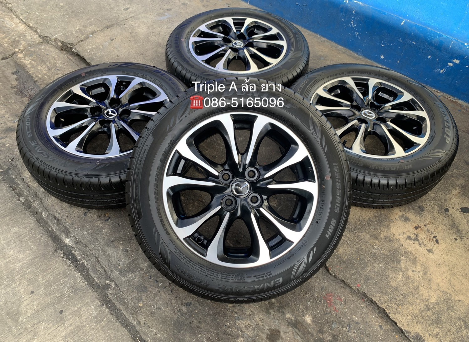 ล้อแม็ก Mazda 2 Skyactiv ขอบ 15 สีดำปัดเงา พร้อมยาง 185-65-15 Dunlop ปลายปี 19