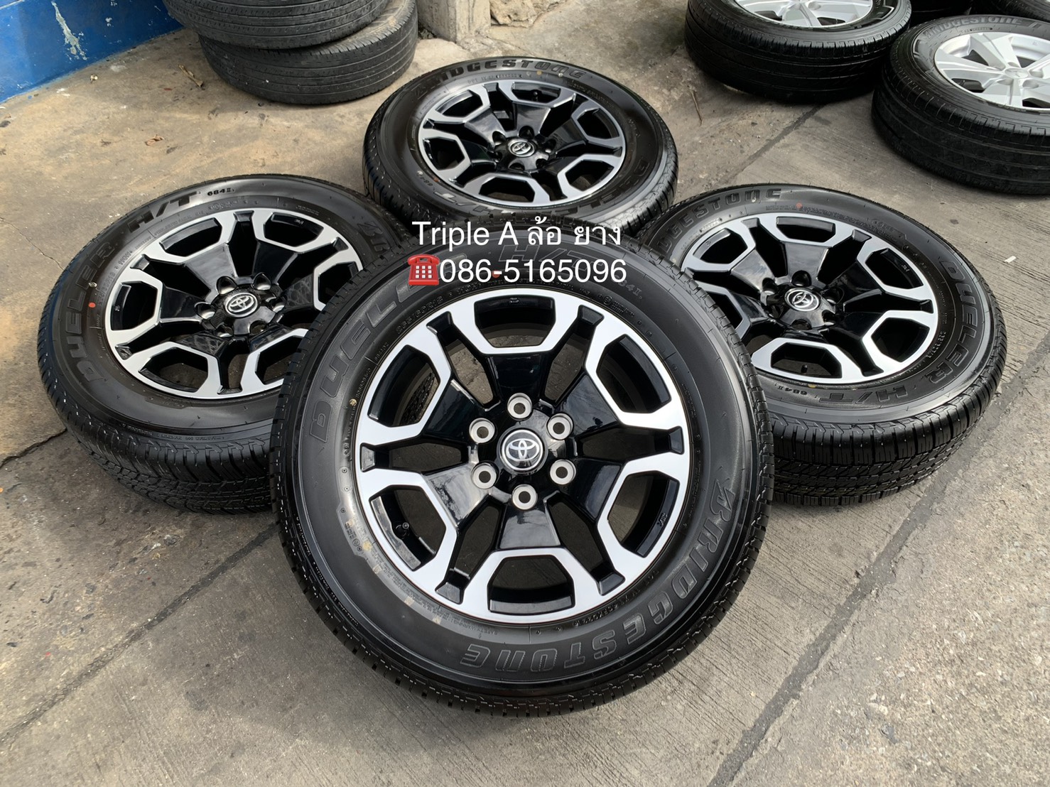 ล้อแม็กป้ายแดง Toyota Revo รุ่นใหม่ล่าสุด ขอบ 18 ดำหน้าเงา พร้อมยางป้ายแดง 265-60-18 Bridgestone ปี 21 สวยกริ๊บ