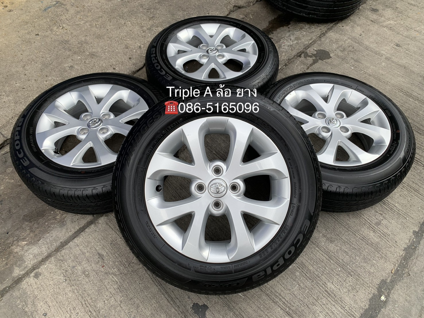 ล้อแม็ก 4รู100 Toyota ขอบ 15 สีบอร์น พร้อมยาง 185-65-15 Bridgestone ปี 18