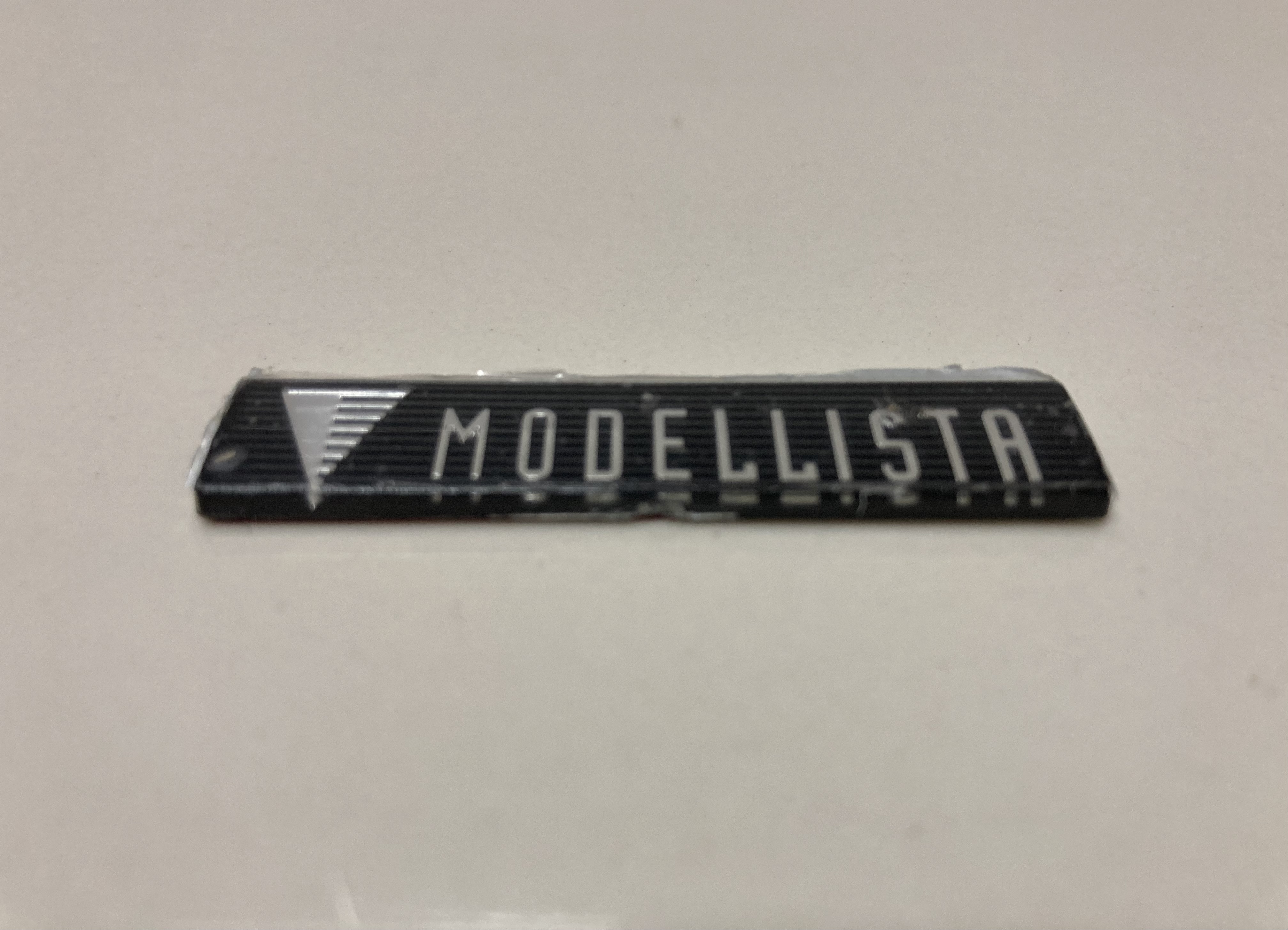 ขายโลโก้แต่งกันชนหน้า MODELLISTA ของรถตู้ TOYOTA รุ่น VELLFIRE SC 2.4L รหัส ANH20 ปี 2008-2022 ขายโลโก้แต่งกันชนหน้า MODELLISTA ของรถตู้ TOYOTA รุ่น VELLFIRE SC 2.4L รหัส ANH20 ปี 2008-2022