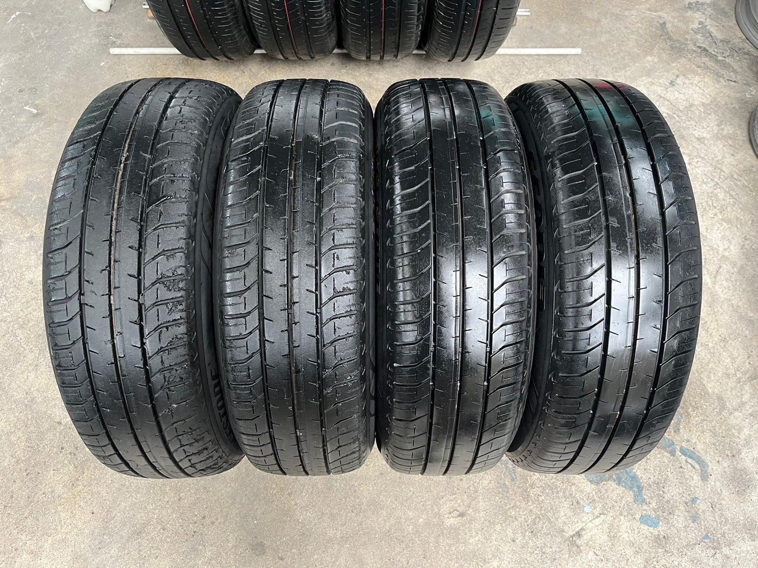 ล้อกระทะ 4รู100 Honda ขอบ 15 พร้อมยาง 185-60-15 Bridgestone ปลายปี 18