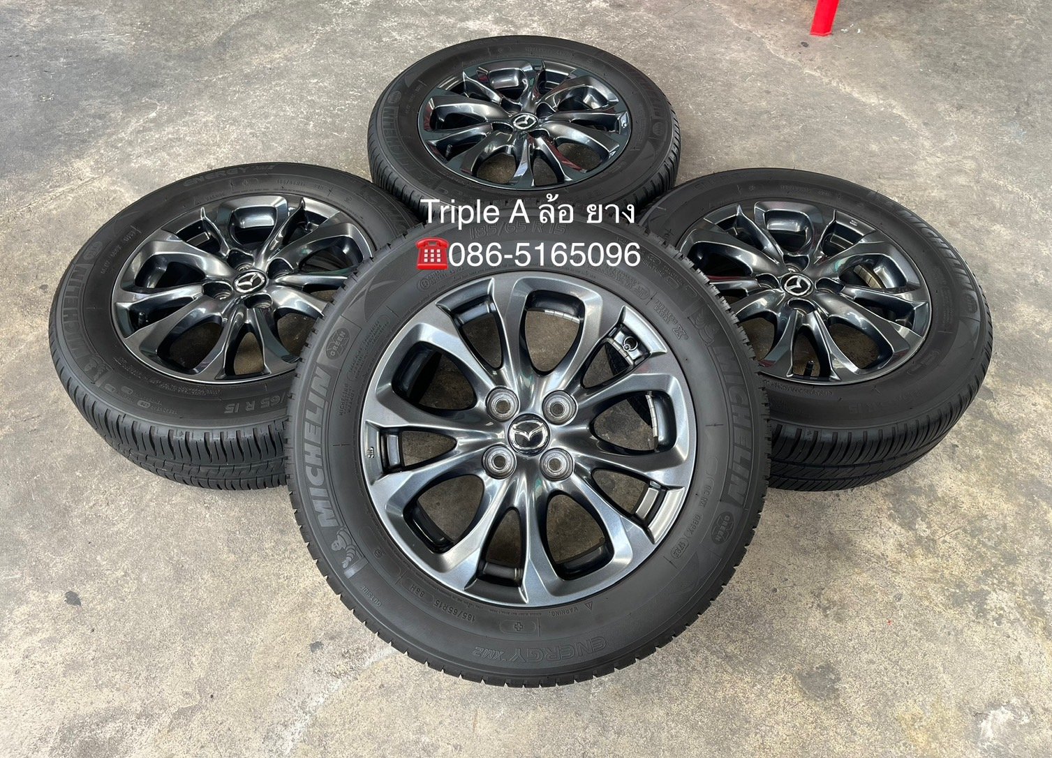 ล้อแม็ก Mazda 2 Skyactiv ขอบ 15 สีเทาดำ พร้อมยาง 185-65-15 Michelin ปี 23
