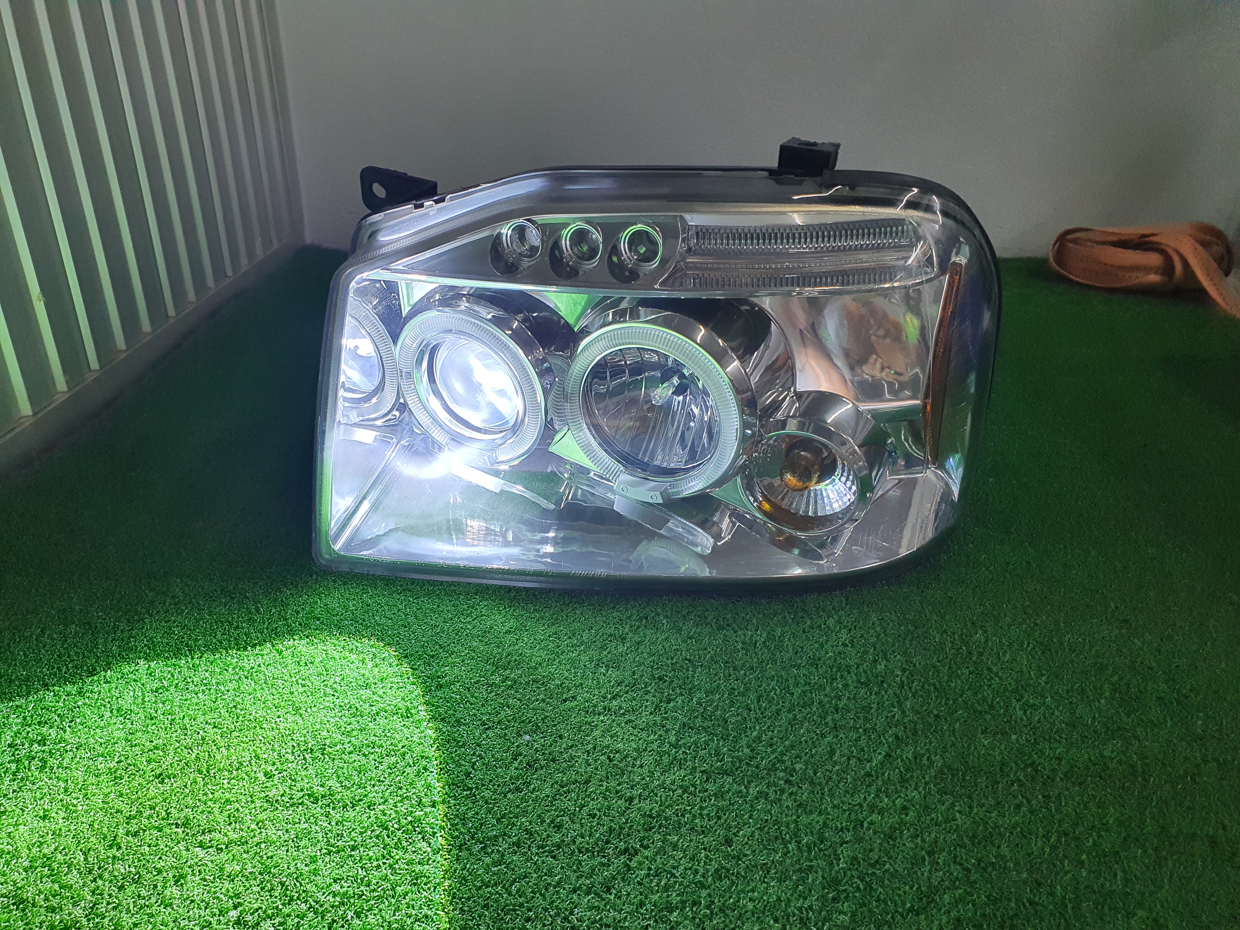 ไฟหน้าโปรเจคเตอร์ NISSAN FRONTIER D22 ไฟหน้าโปรเจคเตอร์ NISSAN FRONTIER D22