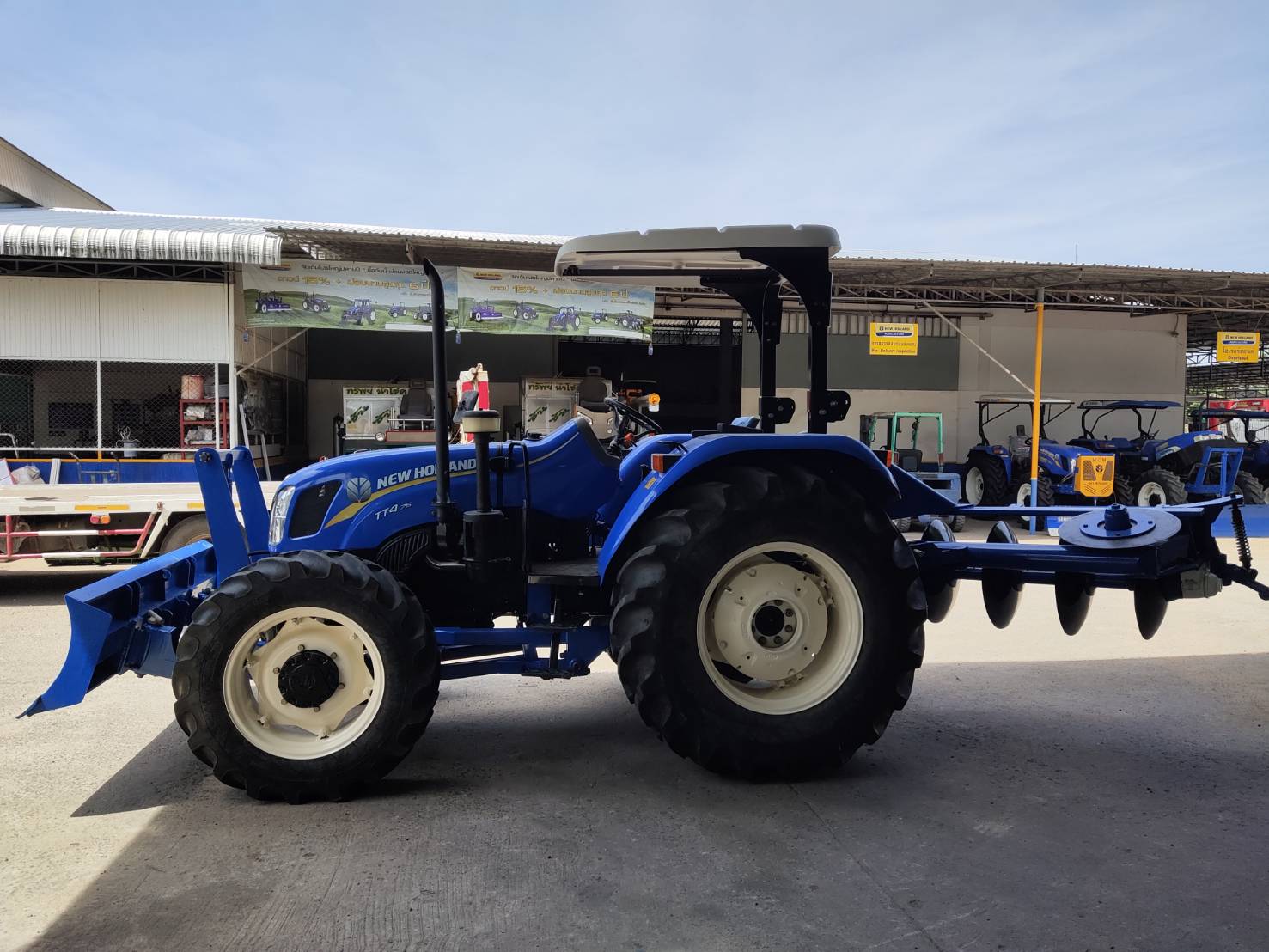 นิว ฮอลแลนด์ รุ่น TT4.75+ใบมีด+ผานพรวน 5 จาน