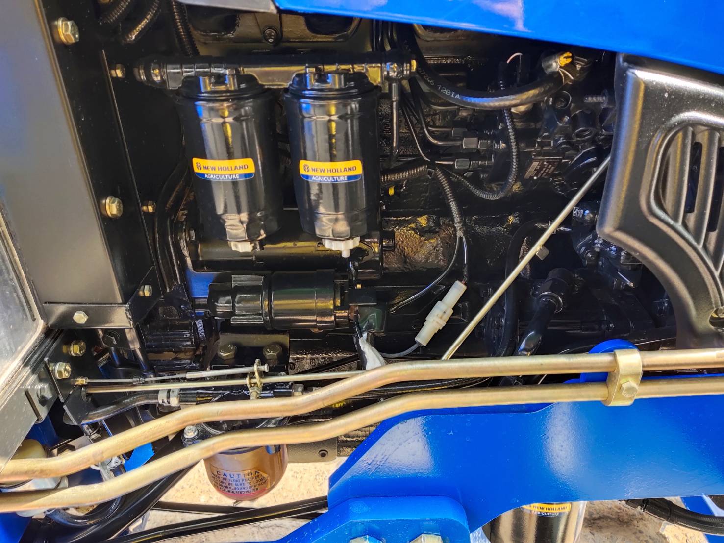 นิว ฮอลแลนด์ รุ่น TT4.75 พร้อมใบมีด และผานพรวน