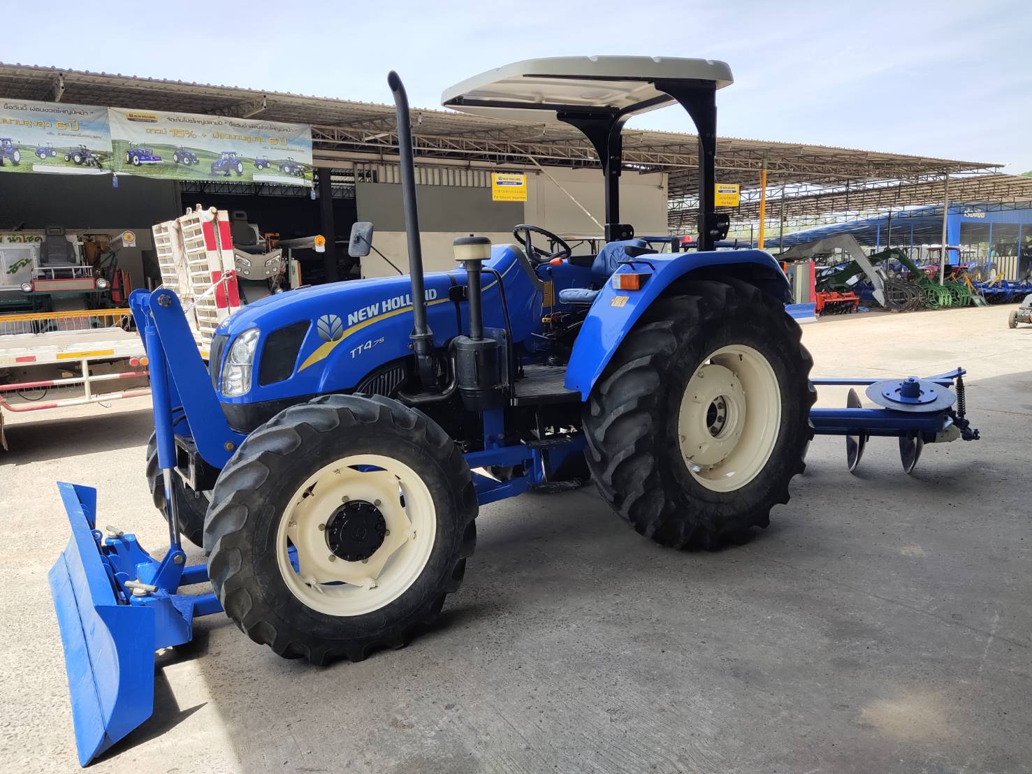 นิว ฮอลแลนด์ รุ่น TT4.75+ใบมีด+ผานพรวน 5 จาน