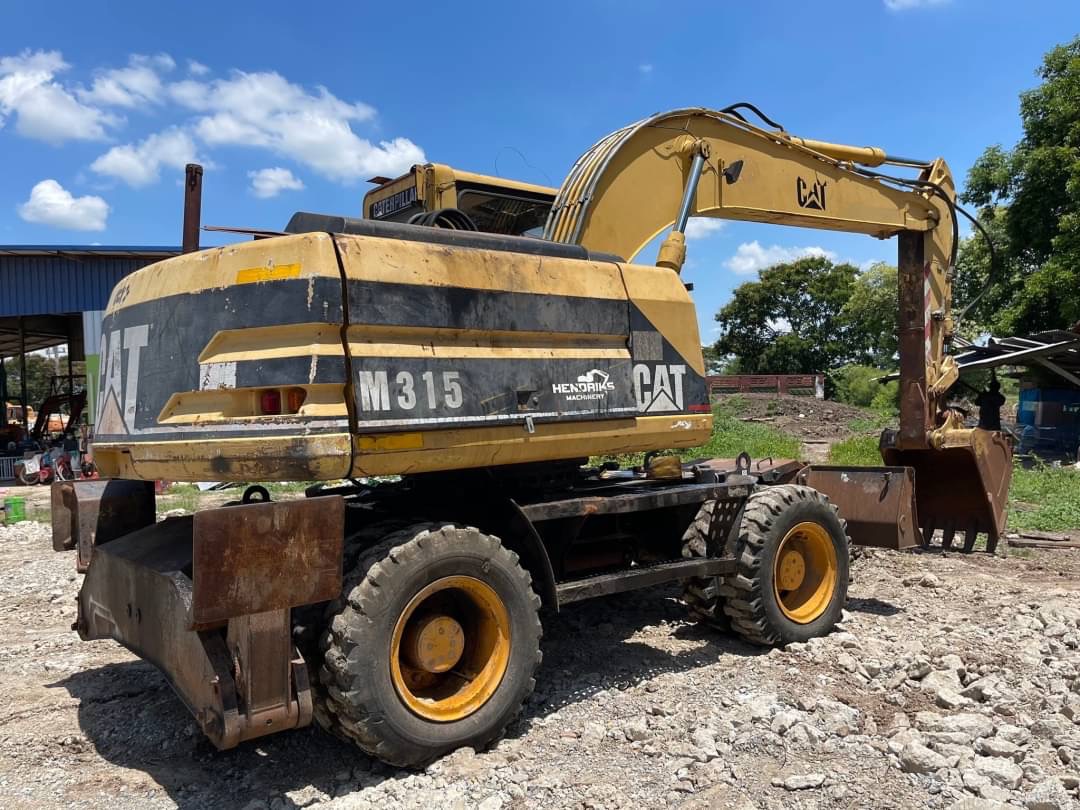 ขาย 795,000 รถแบคโฮล้อยาง CATTERPILLAR M315 สวยสภาพเก่านอก ขาย 795,000 รถแบคโฮล้อยาง CATTERPILLAR M315 สวยสภาพเก่านอก