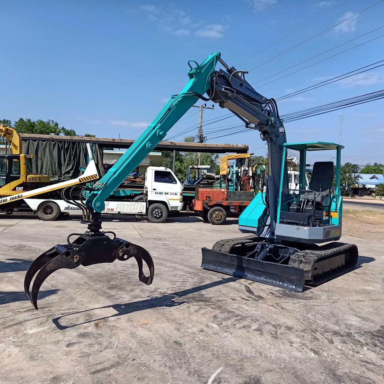 ขาย 485,000 บาท Komatsu PC50UU-1 คีบไม้