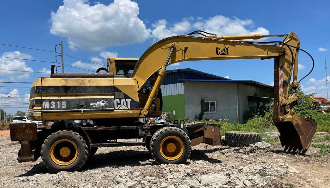 ขาย 795,000 รถแบคโฮล้อยาง CATTERPILLAR M315 สวยสภาพเก่านอก ขาย 795,000 รถแบคโฮล้อยาง CATTERPILLAR M315 สวยสภาพเก่านอก