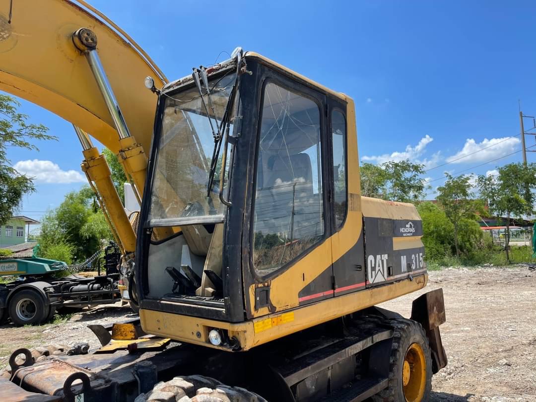 ขาย 795,000 รถแบคโฮล้อยาง CATTERPILLAR M315 สวยสภาพเก่านอก