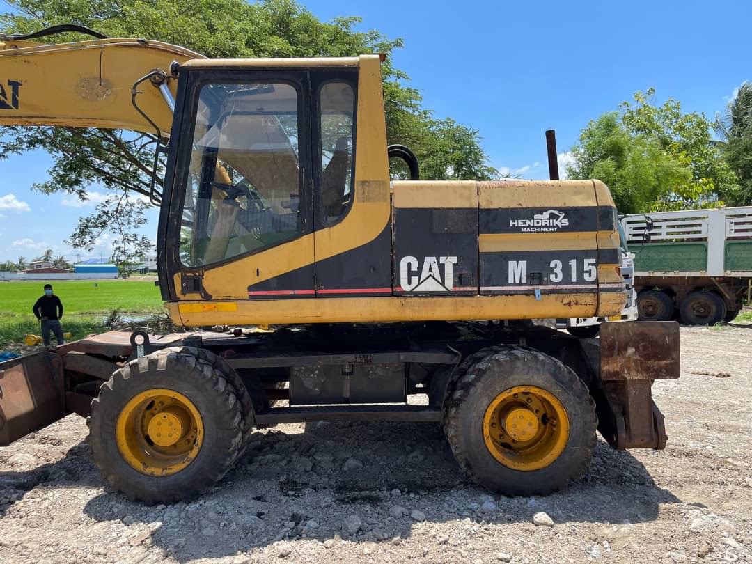 ขาย 795,000 รถแบคโฮล้อยาง CATTERPILLAR M315 สวยสภาพเก่านอก ขาย 795,000 รถแบคโฮล้อยาง CATTERPILLAR M315 สวยสภาพเก่านอก