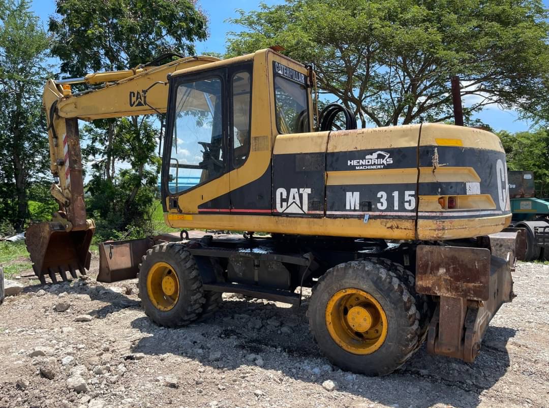 ขาย 795,000 รถแบคโฮล้อยาง CATTERPILLAR M315 สวยสภาพเก่านอก ขาย 795,000 รถแบคโฮล้อยาง CATTERPILLAR M315 สวยสภาพเก่านอก