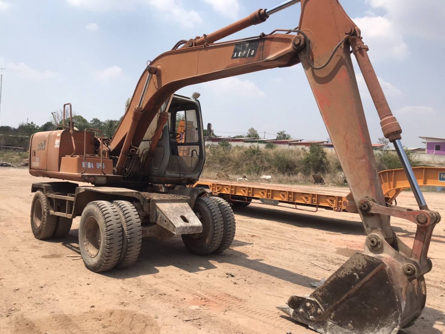 ขายรถแบคโฮ ล้อยาง HITACHI EX100-3 เอกสารเล่มทะเบียน