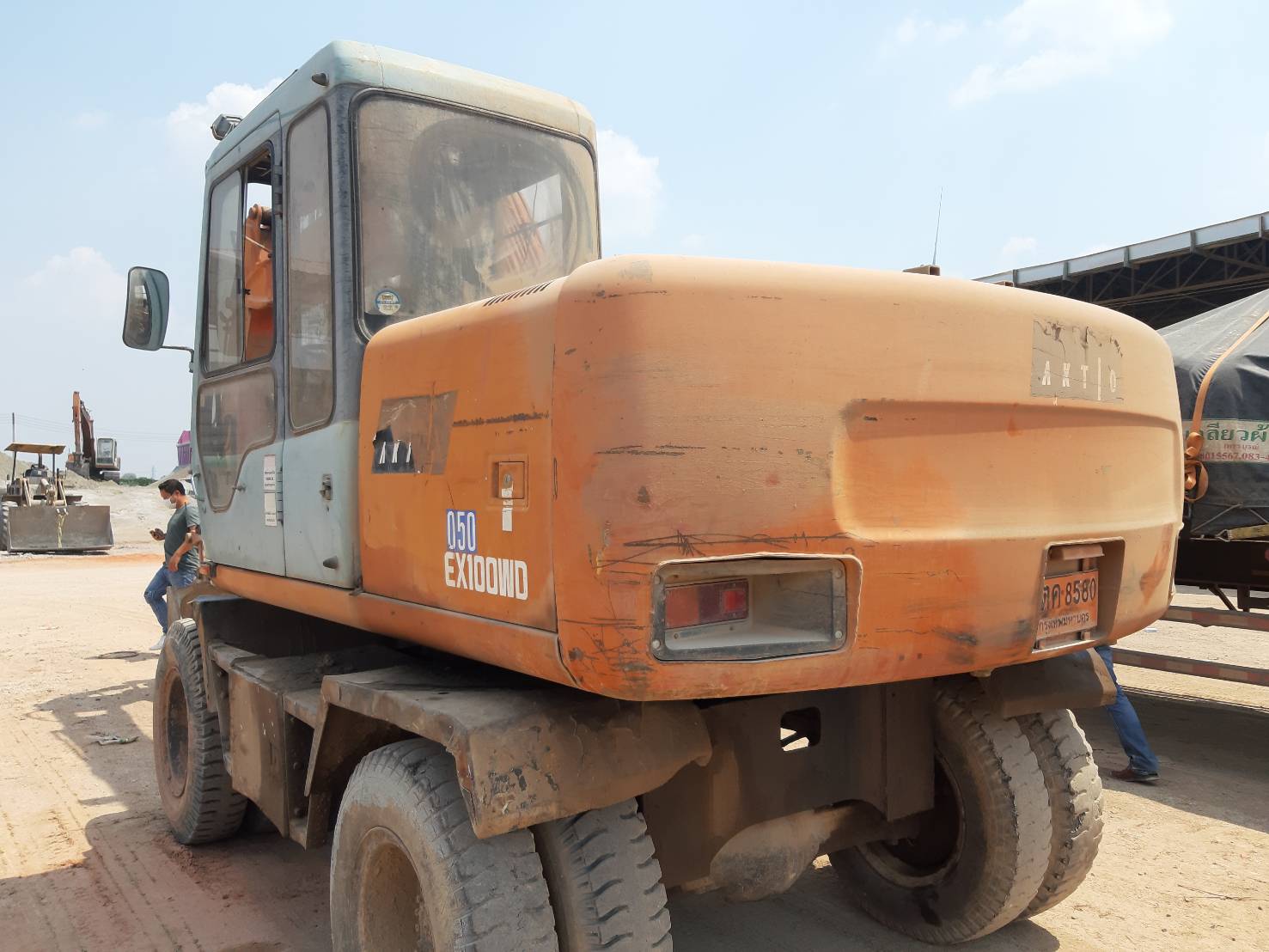 ขายรถแบคโฮ ล้อยาง HITACHI EX100-3 เอกสารเล่มทะเบียน