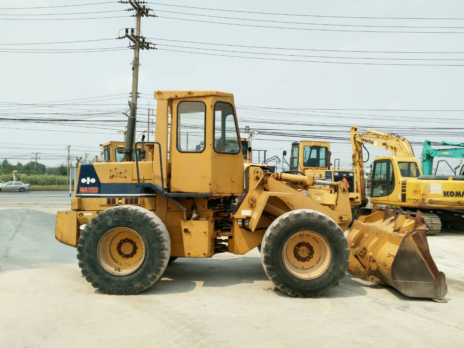 ขายรถตักล้อยาง ยี่ห้อ KOMATSU WA180-1 บุ้งกี๋ 1.8 คิว นำเข้าจากนอกแท้ 100% ไม่เคยใช้งานในไทย ขายรถตักล้อยาง ยี่ห้อ KOMATSU WA180-1 บุ้งกี๋ 1.8 คิว นำเข้าจากนอกแท้ 100% ไม่เคยใช้งานในไทย