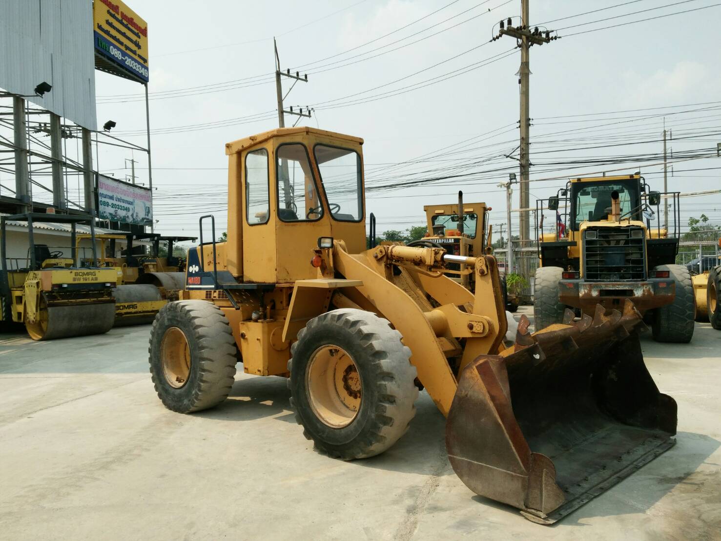 ขายรถตักล้อยาง ยี่ห้อ KOMATSU WA180-1 บุ้งกี๋ 1.8 คิว นำเข้าจากนอกแท้ 100% ไม่เคยใช้งานในไทย ขายรถตักล้อยาง ยี่ห้อ KOMATSU WA180-1 บุ้งกี๋ 1.8 คิว นำเข้าจากนอกแท้ 100% ไม่เคยใช้งานในไทย