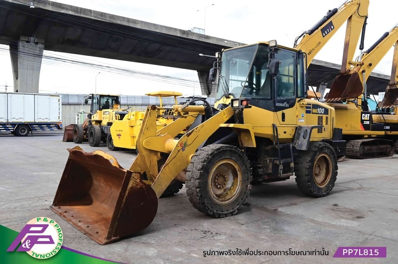 ขายรถตัก KOMATSU WA100-7 รุ่นใหม่ เทียบเท่า 910K ห้องเก๋ง ยางตัน มีฟังก์ชันลดความสั่นสะเทือนขณะขับขี่ Ride control  มือสองสภาพดี นำเข้าจากญี่ปุ่น โดย P&P Pro
