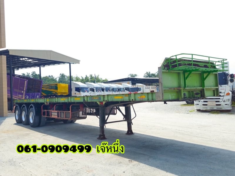 หางพื้นเรียบสามเพลา อู่ พานทอง ปี 2558 (7339) หางพื้นเรียบสามเพลา อู่ พานทอง ปี 2558 (7339)