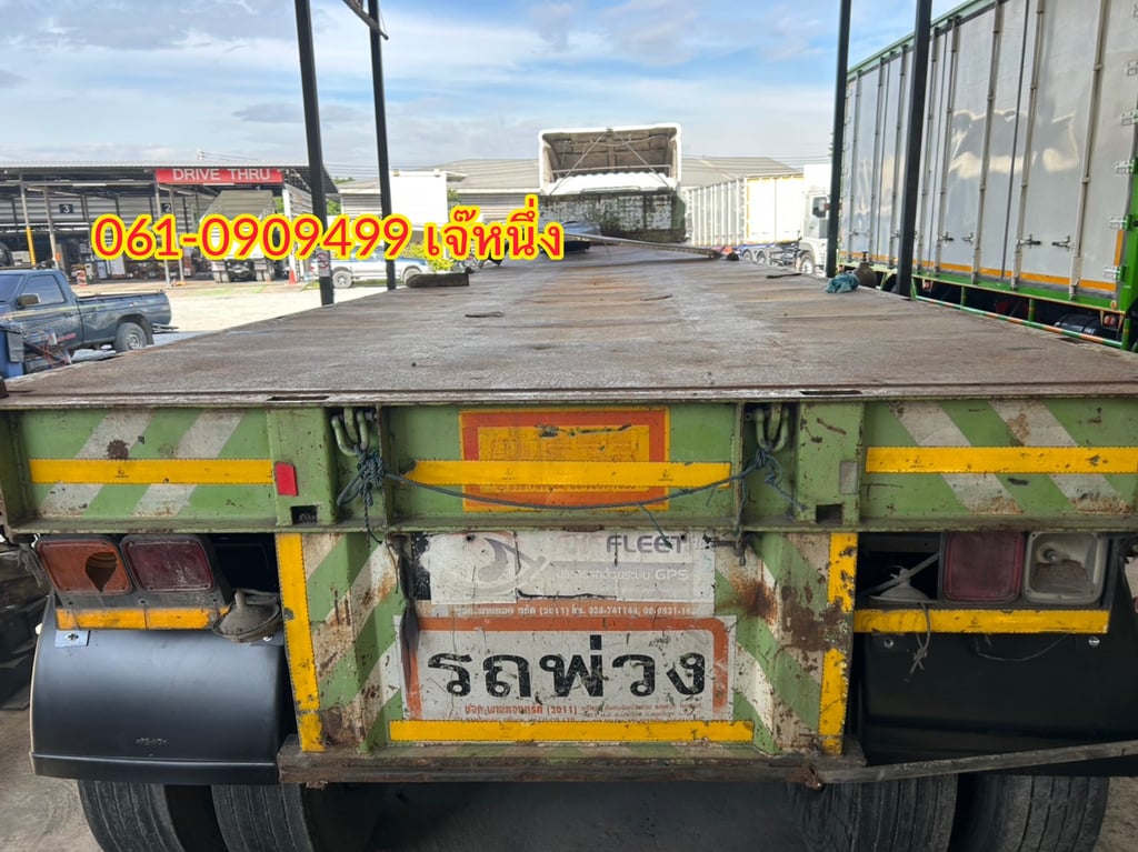 หางพื้นเรียบสามเพลา อู่ พานทอง ปี 2558 (7339) หางพื้นเรียบสามเพลา อู่ พานทอง ปี 2558 (7339)