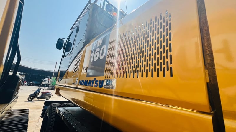 แมคโครล้อยางPW160-7EOพร้อมใช้เล่มทะเบียนแอร?เย็น