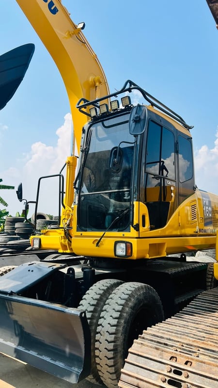 แมคโครล้อยางPW160-7EOพร้อมใช้เล่มทะเบียนแอร?เย็น