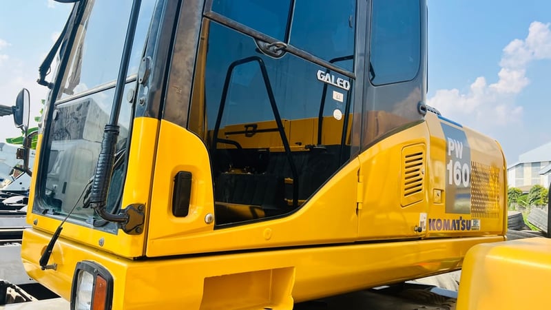 แมคโครล้อยางPW160-7EOพร้อมใช้เล่มทะเบียนแอร?เย็น