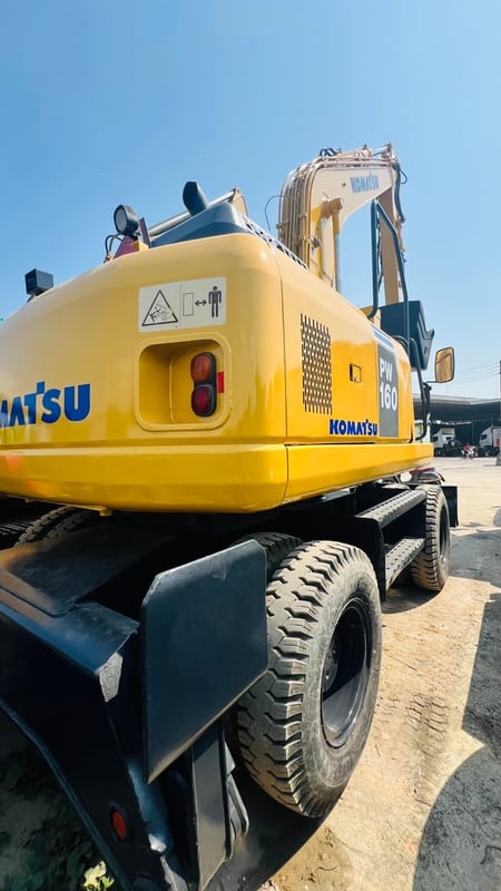 แมคโครล้อยางPW160-7EOพร้อมใช้เล่มทะเบียนแอร?เย็น