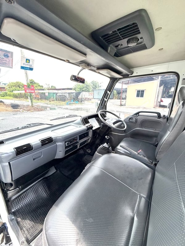 ISUZU NKR 100 แรงเทอร์โบ ( 4ล้อ ไม่ติดเวลา) กระบะเหล็ก ปี 2004 
