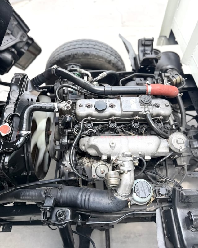 ISUZU NKR 100 แรงเทอร์โบ ( 4ล้อ ไม่ติดเวลา) กระบะเหล็ก ปี 2004 