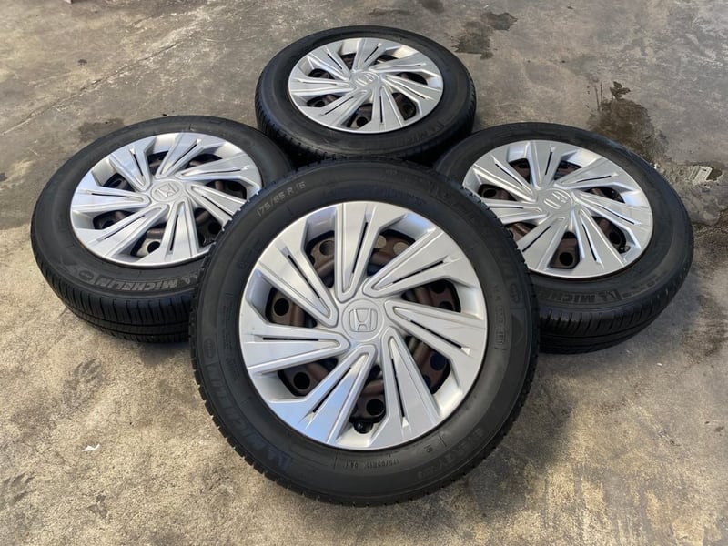 ล้อกระทะ 4รู100 Honda ขอบ 15 แถมยาง 175-65-15 Michelin ปี 21
