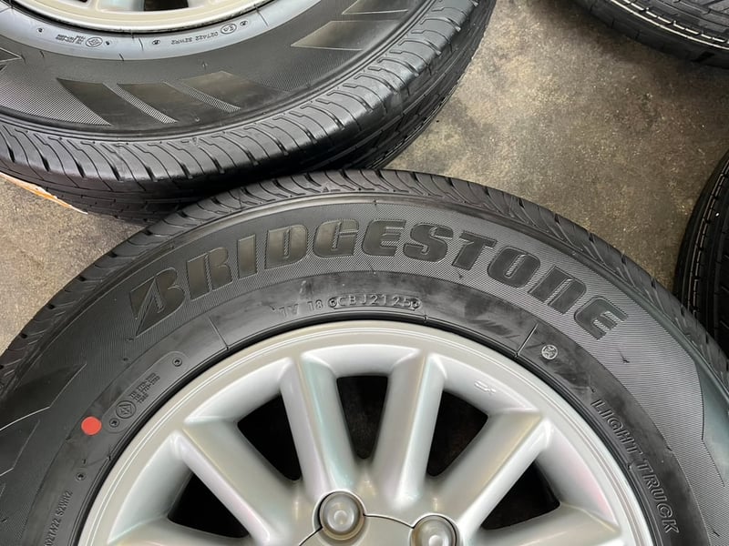 ล้อแม็ก ISUZU D-Max ขอบ 15 พร้อมยางใหม่ 215-70-15 Bridgestone ปี 25