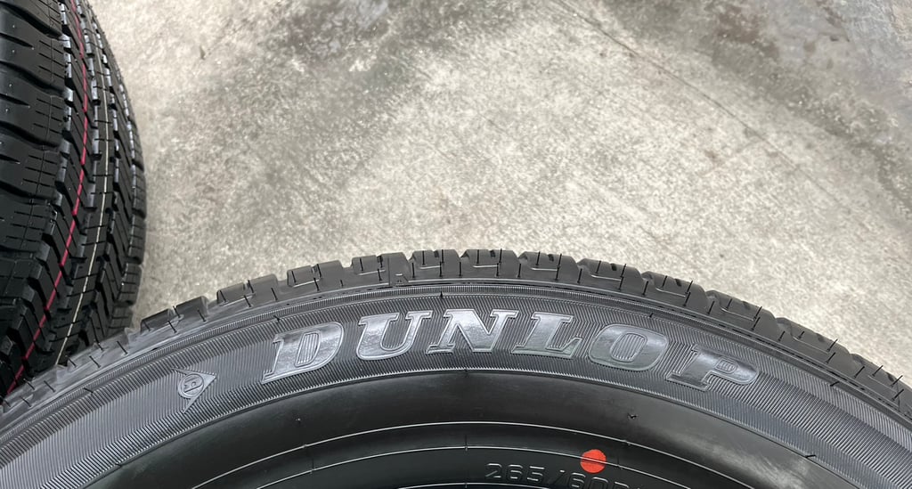 ยางใหม่ป้ายแดง 265-60-18 Dunlop ปี 25 ใหม่กริ๊บ ถอดจากโชว์รูม