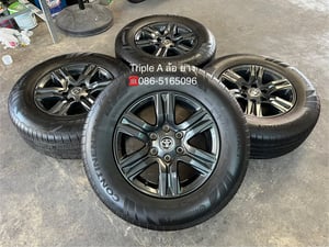 ล้อแม็ก Toyota Revo ขอบ 17 สีเทาดำ พร้อมยาง 265-65-17 Continental ปี 25 สภาพสวย