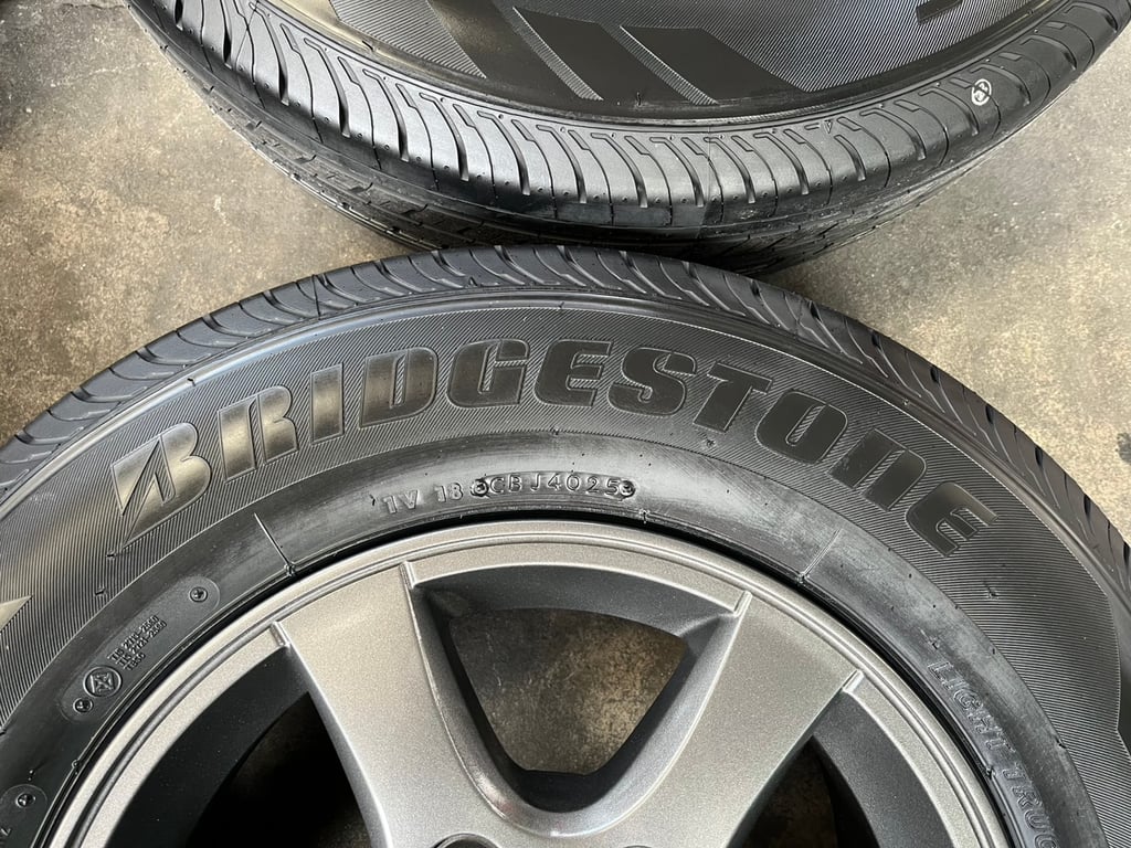 ล้อแม็ก ISUZU D-Max Patinum ขอบ 15 สีเทาดำ พร้อมยางใหม่ 215-70-15 Bridgestone ปลายปี 25 ล้อแม็ก ISUZU D-Max Patinum ขอบ 15 สีเทาดำ พร้อมยางใหม่ 215-70-15 Bridgestone ปลายปี 25
