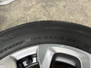 ล้อแม็ก Mazda 2 Skyactive ขอบ 15 สีเทา แถมยาง 185-65-15 Dunlop ปี 21